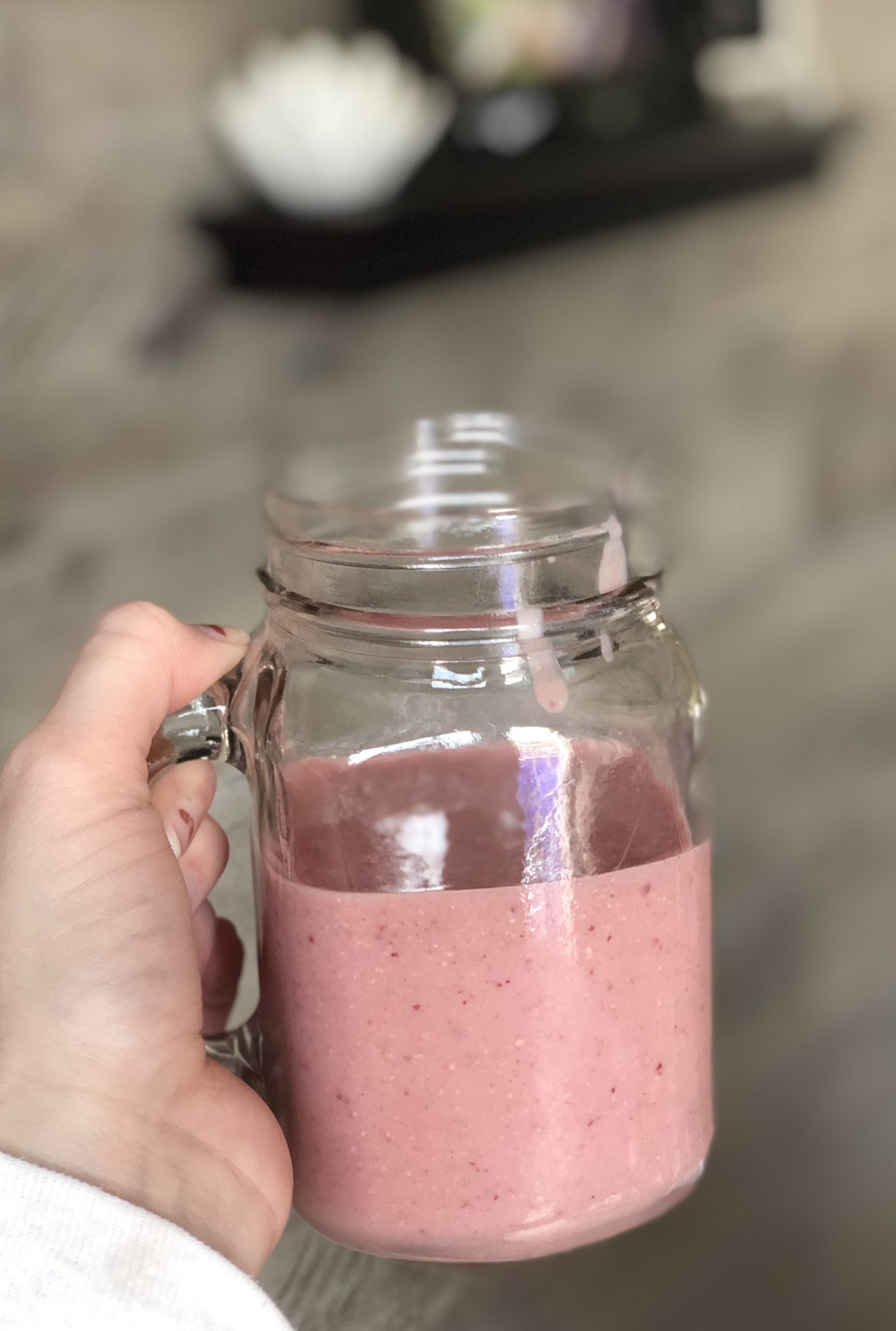strawberry banana smoothie in a jar